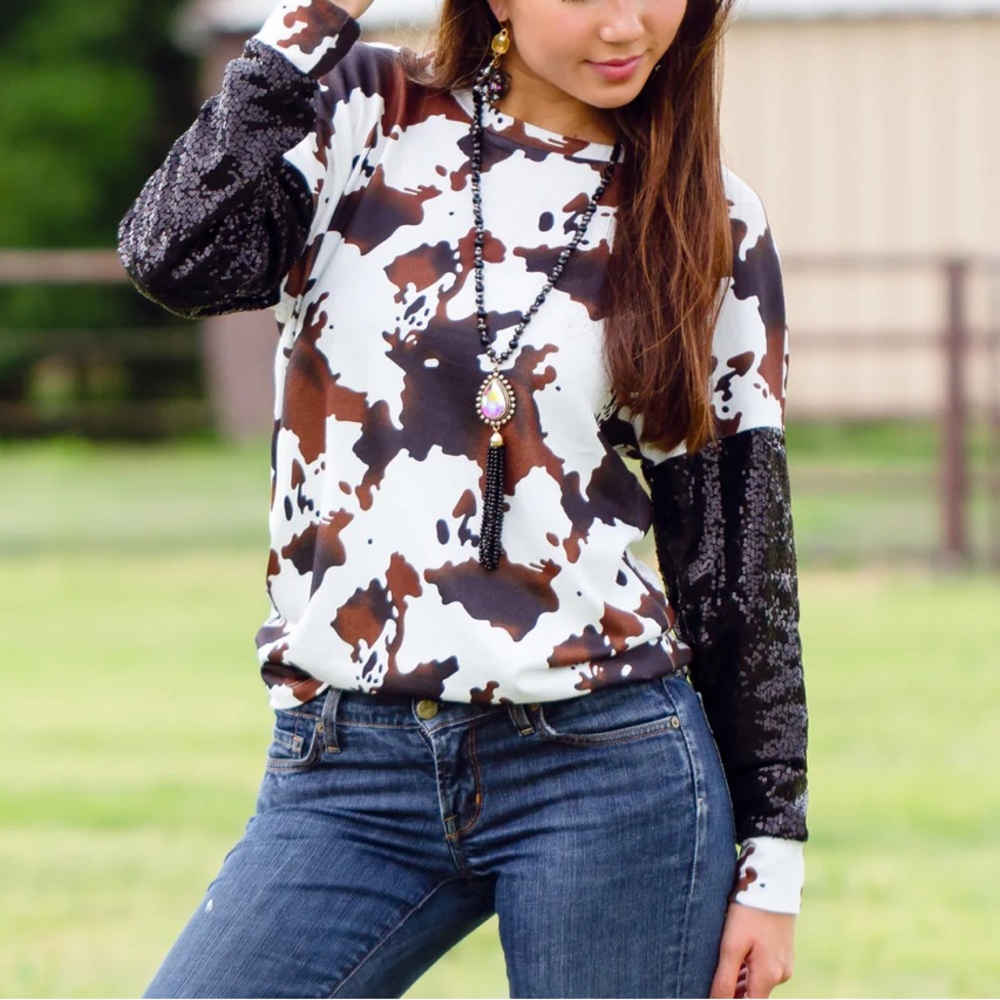 Sunshine & Rodeos Cow Print Sequin Sleeve Sweater